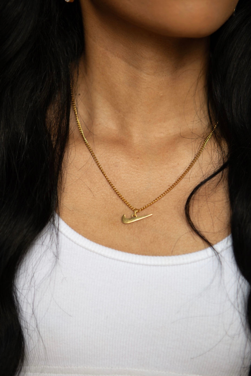 Nike swoosh gold sales chain
